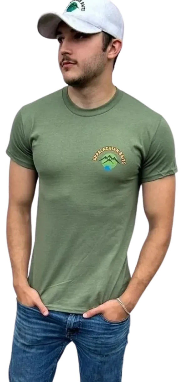 A man wearing a green shirt with mountains on it.