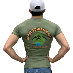 A man in green shirt and hat with mountains on back.