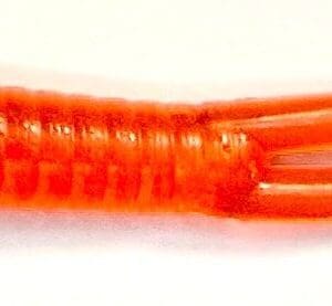 A close up of an orange stick