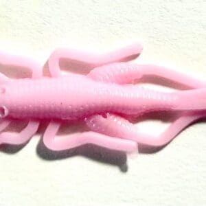 A pink plastic toy of an octopus.