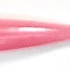 A close up of the pink color of a pen