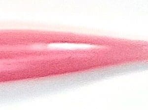 A close up of the pink color of a pen