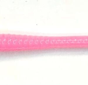 A pink toothbrush with a white stripe on it.