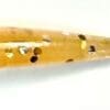 A close up of the end of a wooden spoon