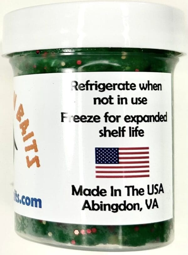 A jar of green fish food with the label for freeze for expanded shelf life.