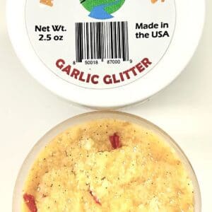 A container of garlic glitter next to another container.