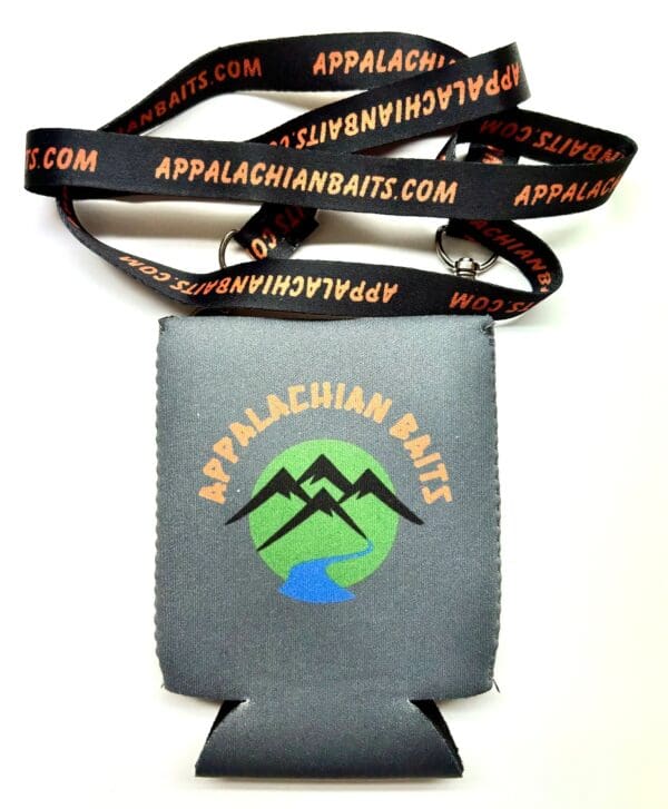 A gray can holder with a black lanyard and a logo.