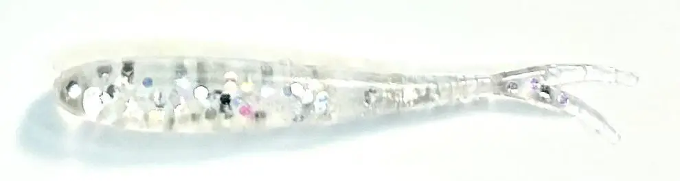 A blurry image of the side of a skateboard.