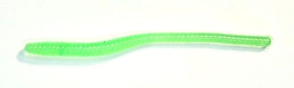 A green plastic tube with a long handle.