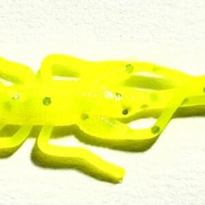 A yellow plastic snake with holes in it.