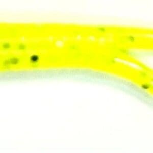 A yellow fishing lure with black specks on it.