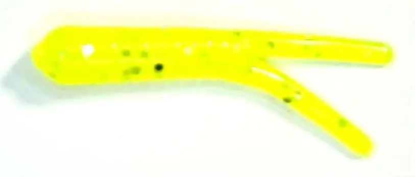 A yellow fishing lure with black specks on it.