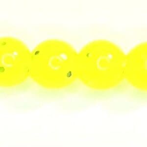 A row of yellow beads sitting on top of each other.