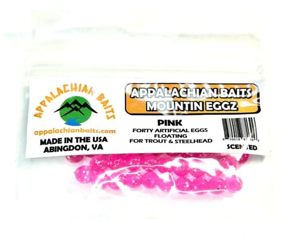 A package of pink plastic eggs for trout and steelhead.