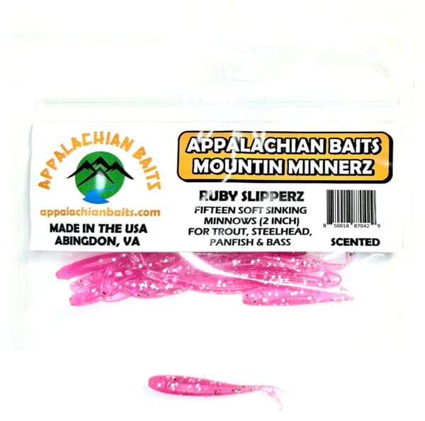 A package of pink worm fishing baits.