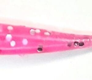 A pink fish with white dots on it.