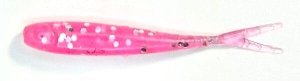 A pink fish with white dots on it.