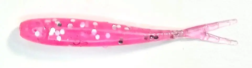 A pink fish with white dots on it.