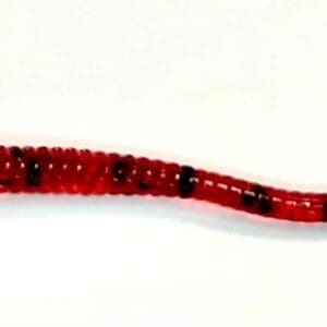 A red snake is shown with black spots.