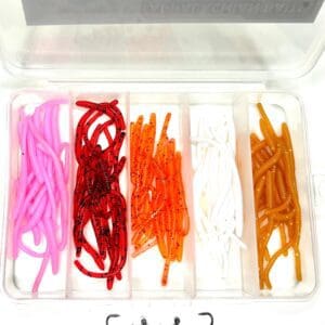 A box of different colored plastic fishing hooks.