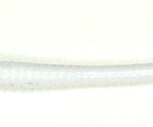 A white toothbrush with a long handle.