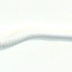 A white toothbrush with a long handle and no bristles.