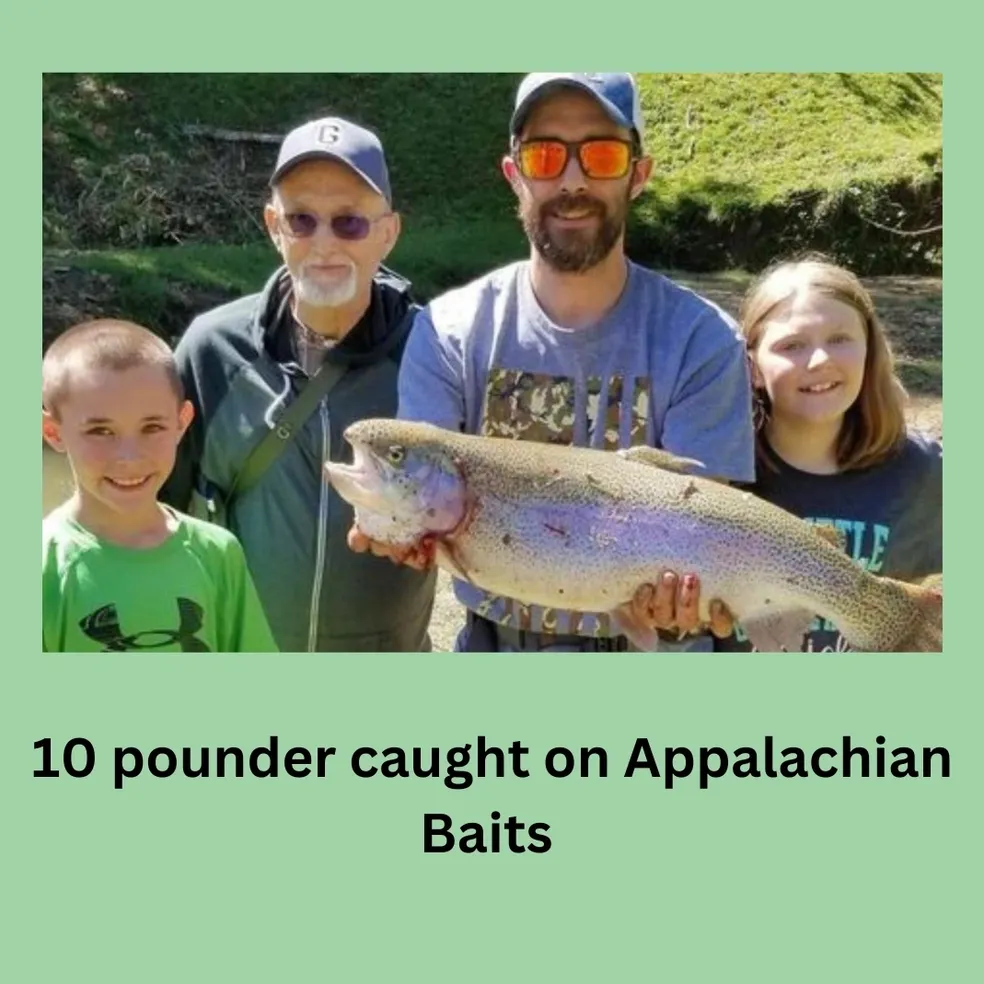 A family with one of the kids is holding a fish.