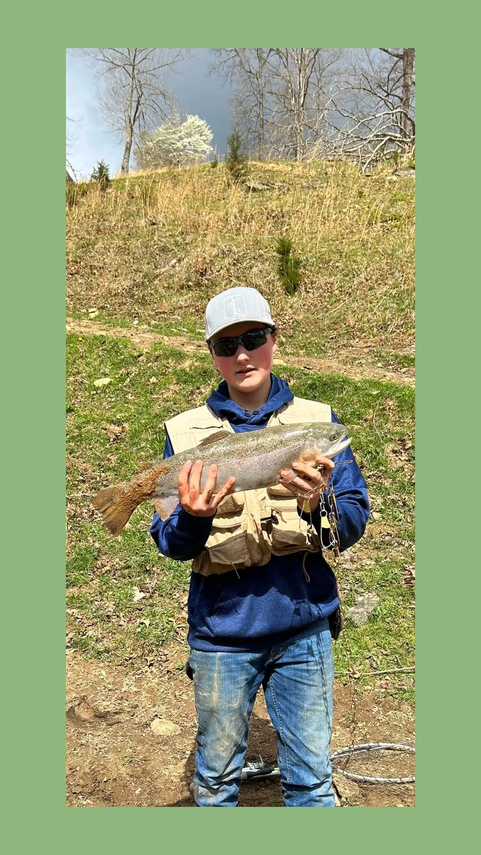 A man holding a fish in his hands.